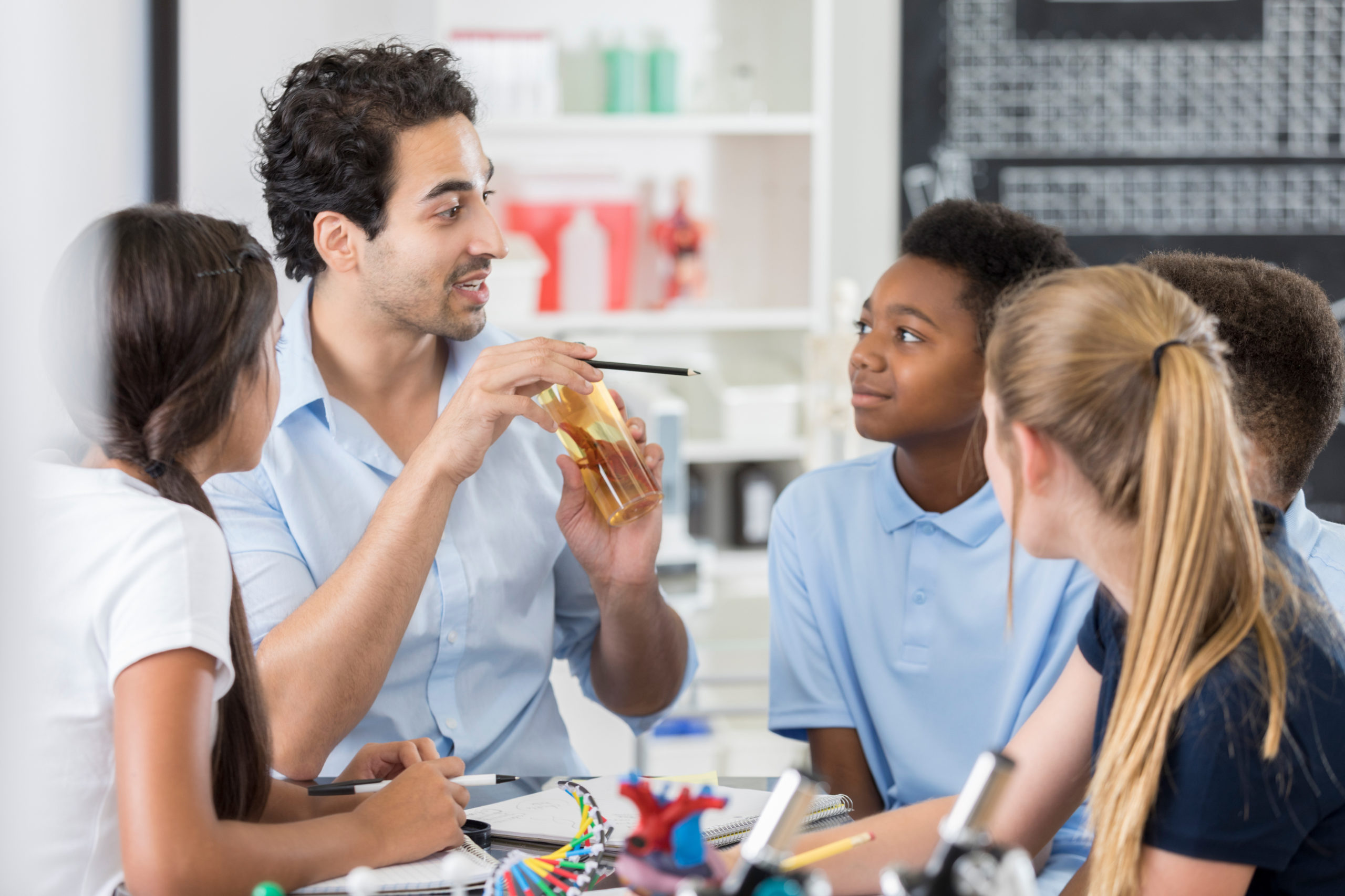 Interested middle school students in biology class